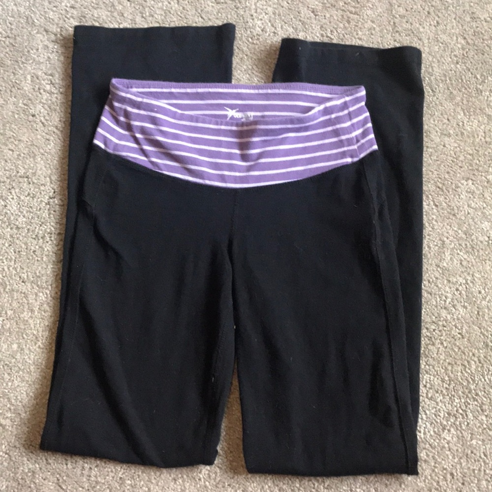 Yoga pants with wide waistband.